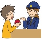 落し物を取り扱う警察官